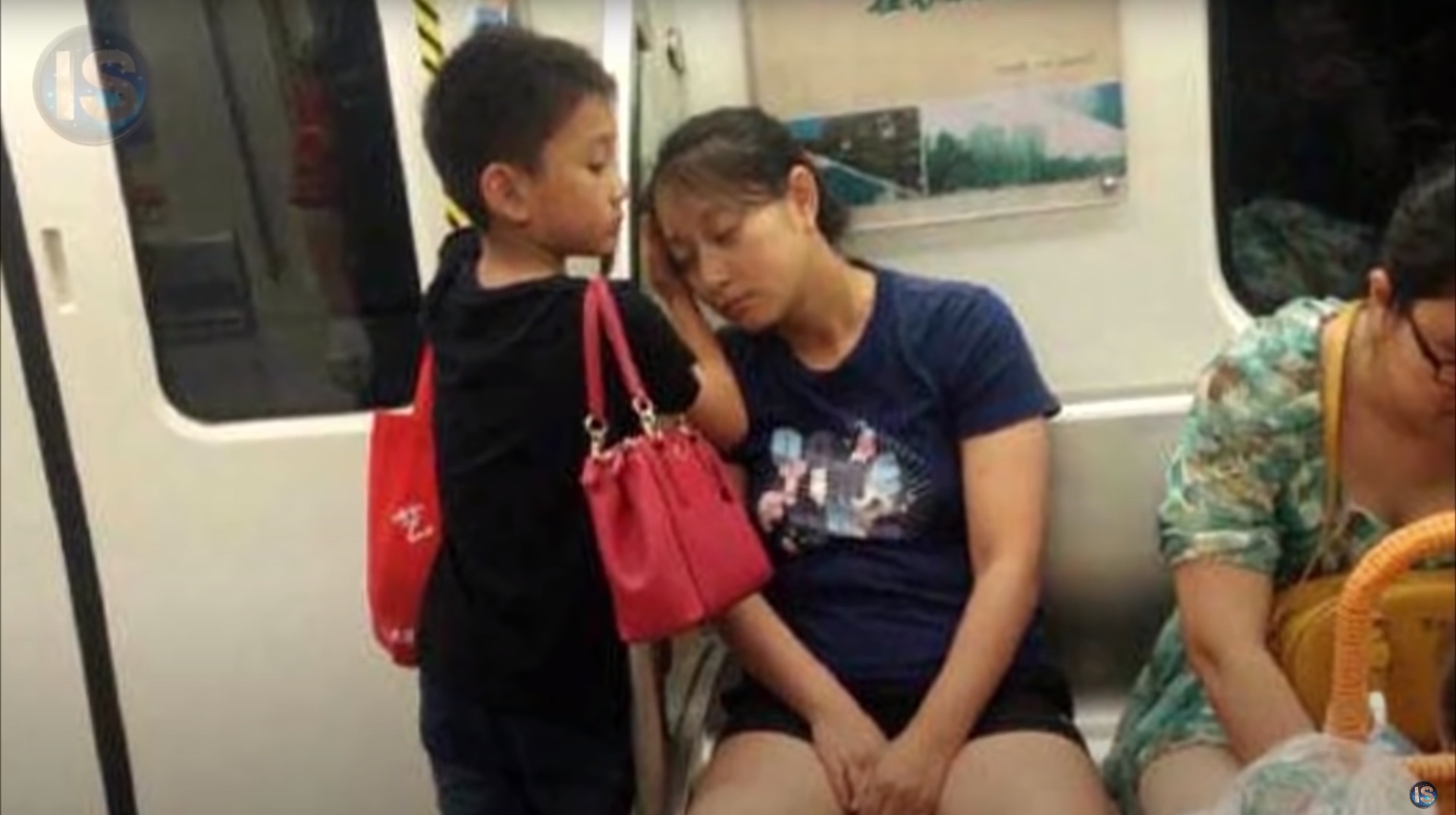 The boy was helping his mother to sleep a while.